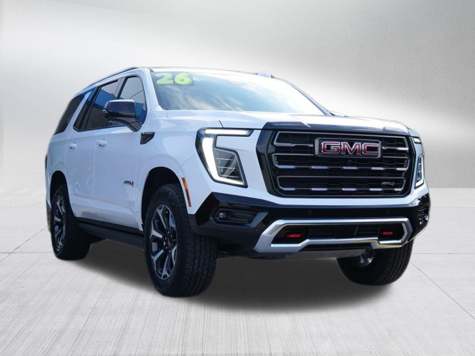 2026 GMC Yukon AT4 Ultimate in Summit White — front three-quarter view