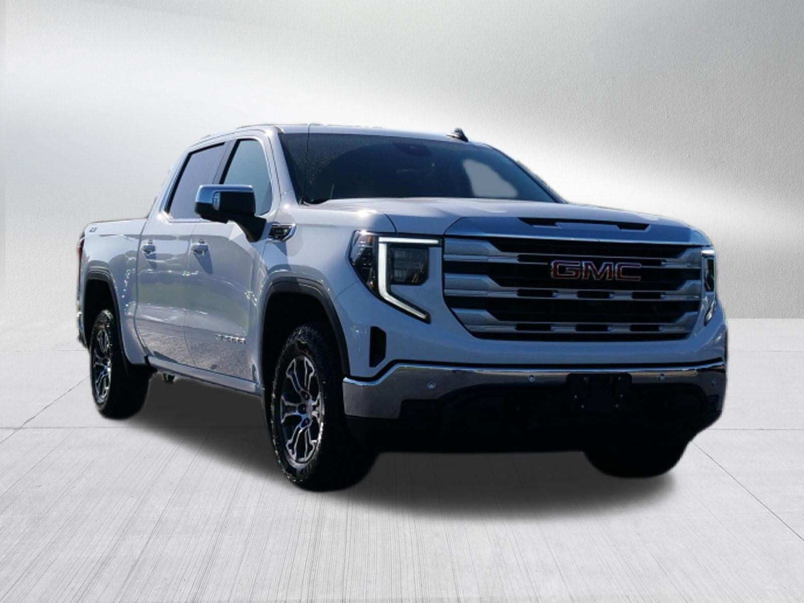 2026 GMC Sierra 1500 SLE in Summit White — front three-quarter view